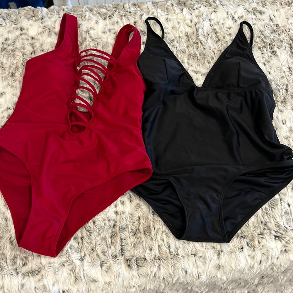 NWOT never worn 1 piece swim suits 2 red is a small black is a medium